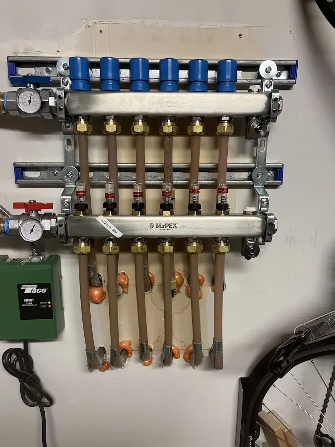 Plumber performing Leak Detection at a residential property in Surrey